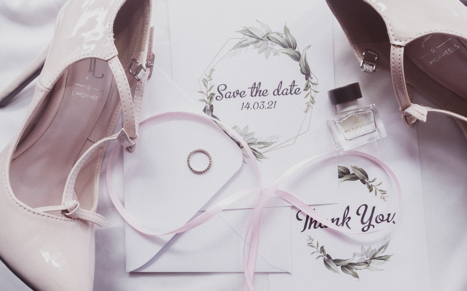 Garden wedding reception with blush and cream florals and string lights