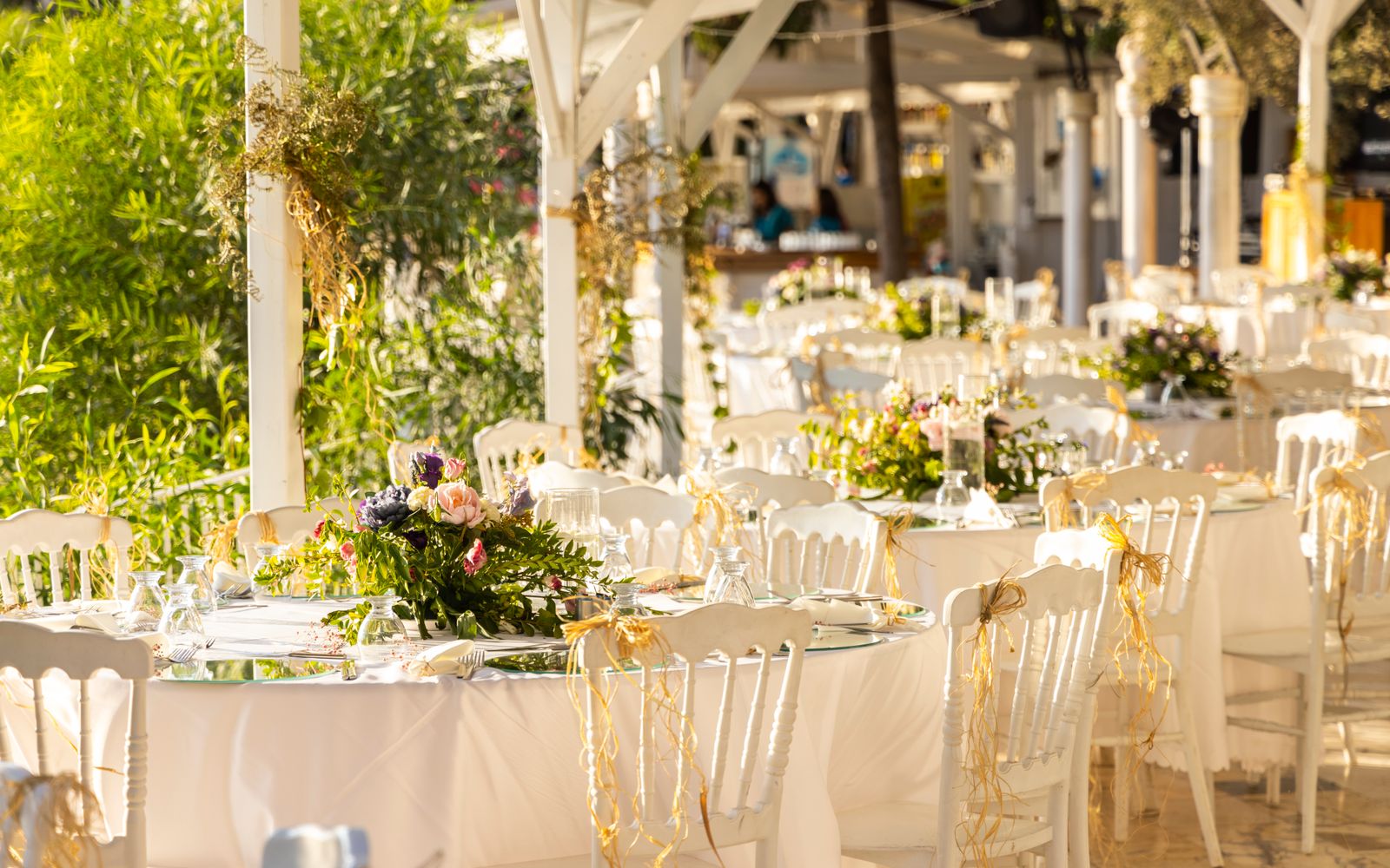 Black-tie gala ballroom with staged lighting and round dinner tables