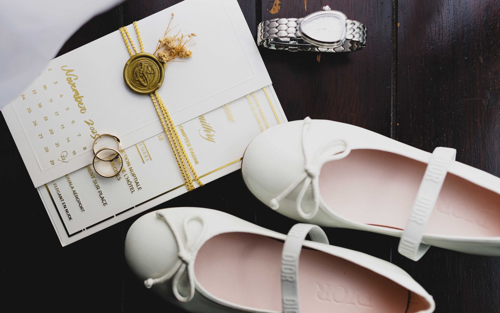 Planner reviewing a wedding layout and vendor timeline at a desk